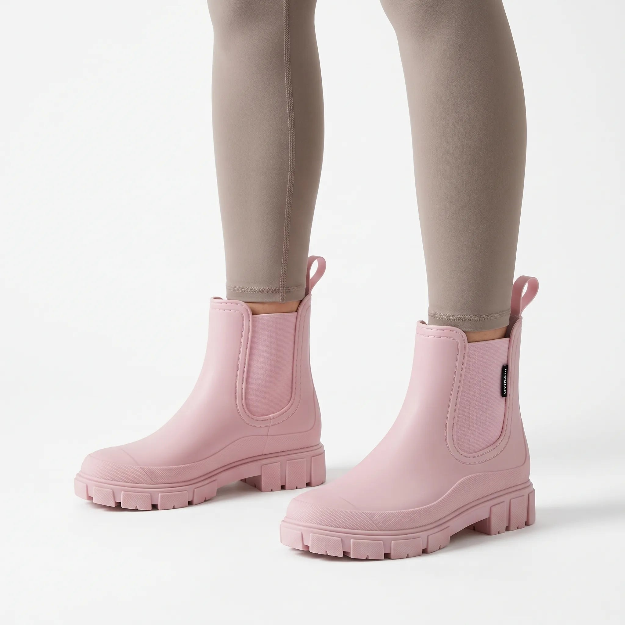 Rainstride  - Chunky Sole Ankle Wellies Navigating Wet Streets