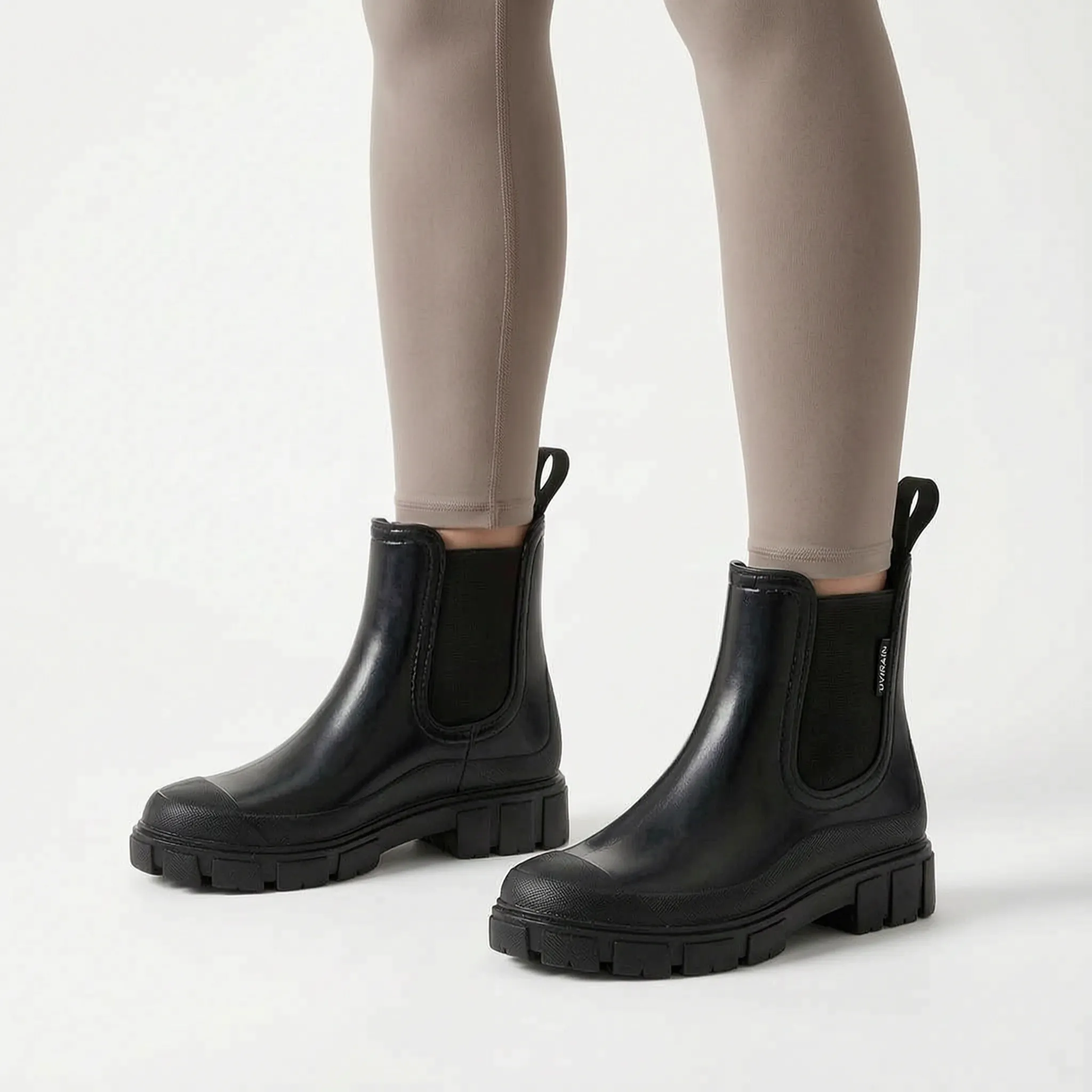 Rainstride  - Chunky Sole Ankle Wellies Navigating Wet Streets